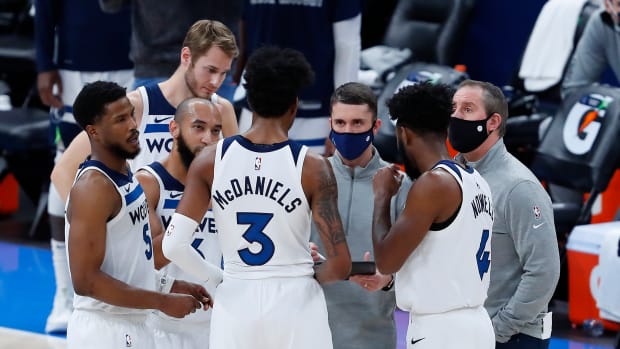 Feb 6, 2021; Oklahoma City, Oklahoma, USA; Minnesota Timberwolves head coach Ryan Saunders (middle, facing camera) talks to his team during a time out against the Oklahoma City Thunder in the second half at Chesapeake Energy Arena. Oklahoma City won 120-118. Mandatory Credit: Alonzo Adams-USA TODAY Sports